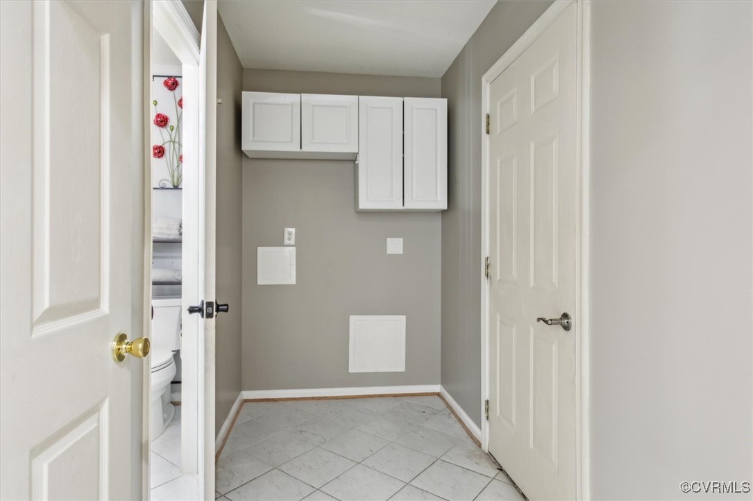 203 Oaktree Road, Unit A Williamsburg, VA 23188 - Photo 18 of 46 Washroom with light tile patterned flooring
