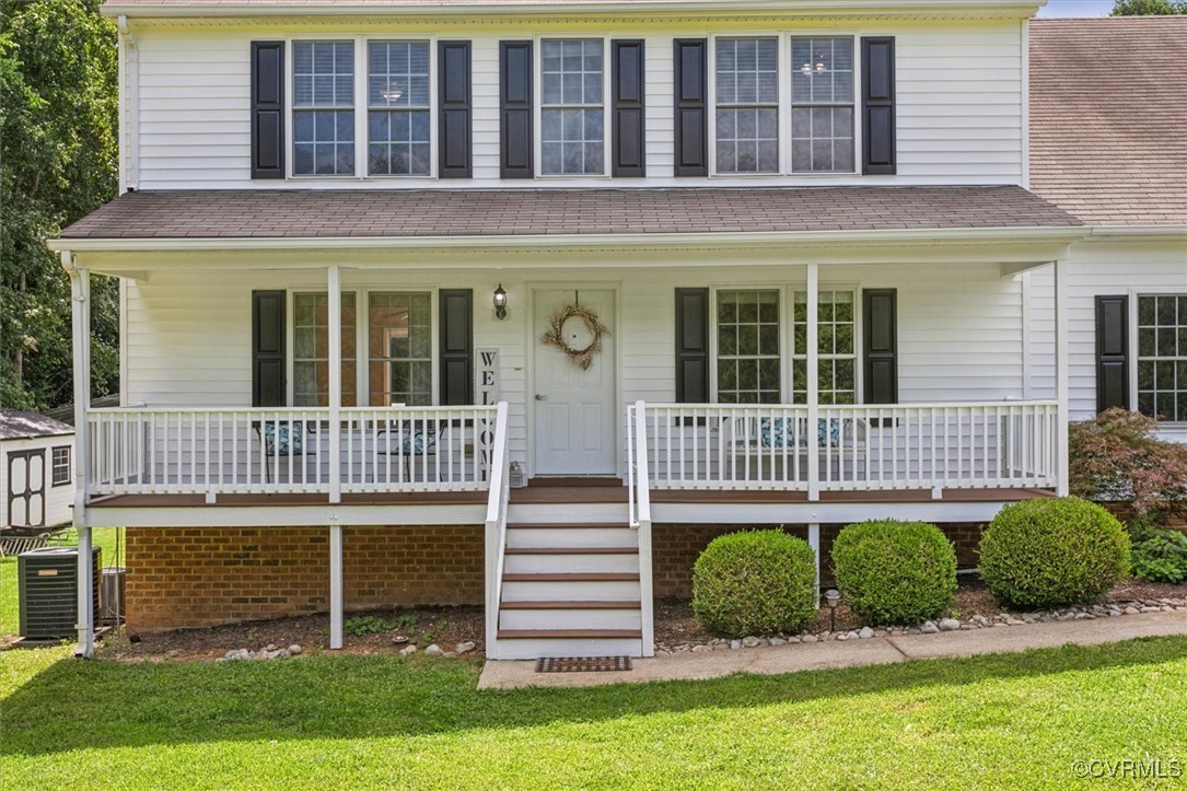 203 Oaktree Road, Unit A Williamsburg, VA 23188 - Photo 2 of 46 View of front of home featuring covered porch and
