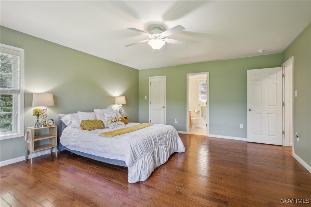 203 Oaktree Road, Unit A Williamsburg, VA 23188 - Photo 24 of 46 Bedroom with ensuite bathroom, dark wood-type floo