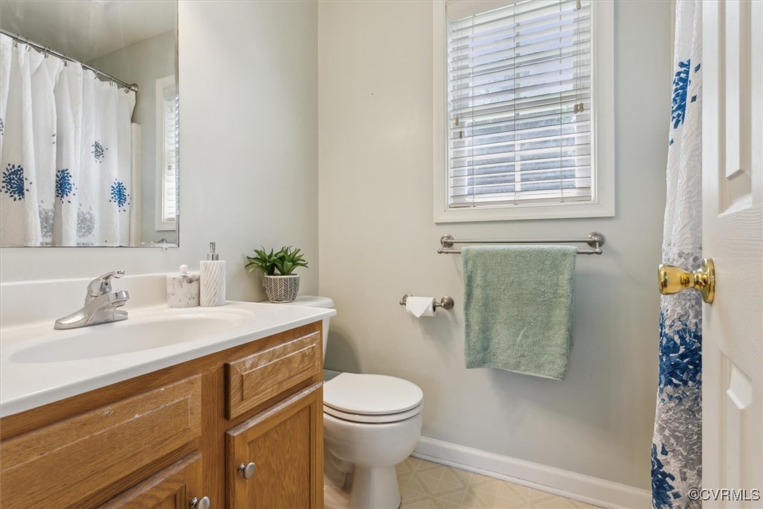 203 Oaktree Road, Unit A Williamsburg, VA 23188 - Photo 26 of 46 Bathroom with vanity and toilet