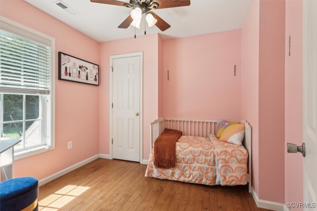 203 Oaktree Road, Unit A Williamsburg, VA 23188 - Photo 27 of 46 Bedroom with hardwood / wood-style floors and ceil