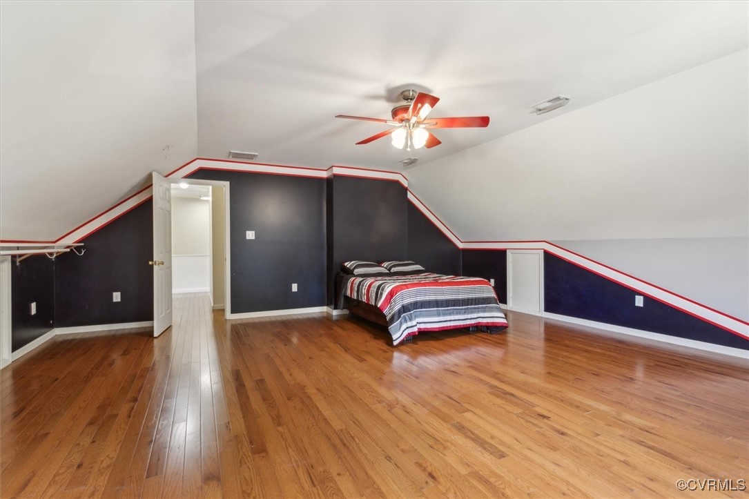 203 Oaktree Road, Unit A Williamsburg, VA 23188 - Photo 34 of 46 Unfurnished bedroom with ceiling fan, wood-type fl
