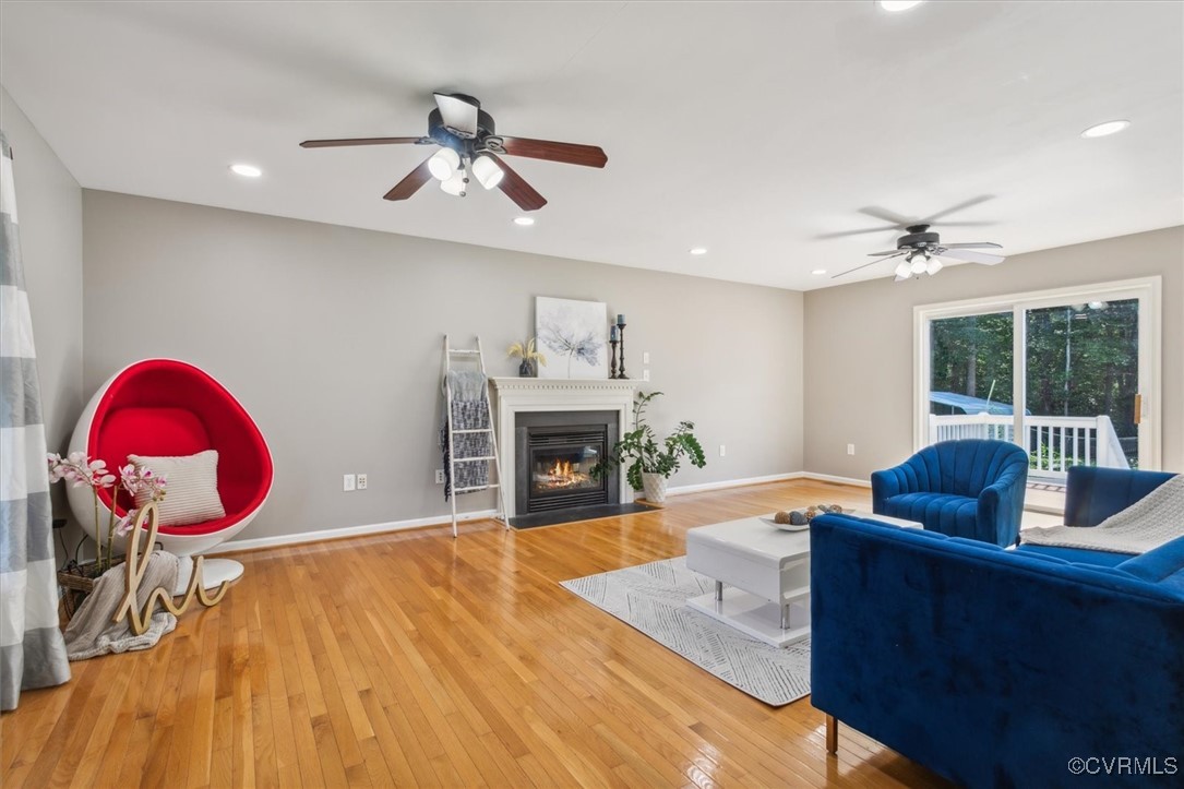 203 Oaktree Road, Unit A Williamsburg, VA 23188 - Photo 4 of 46 Living room featuring wood-type flooring and ceili