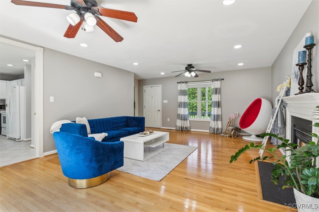 203 Oaktree Road, Unit A Williamsburg, VA 23188 - Photo 9 of 46 Living room featuring ceiling fan and light wood-t