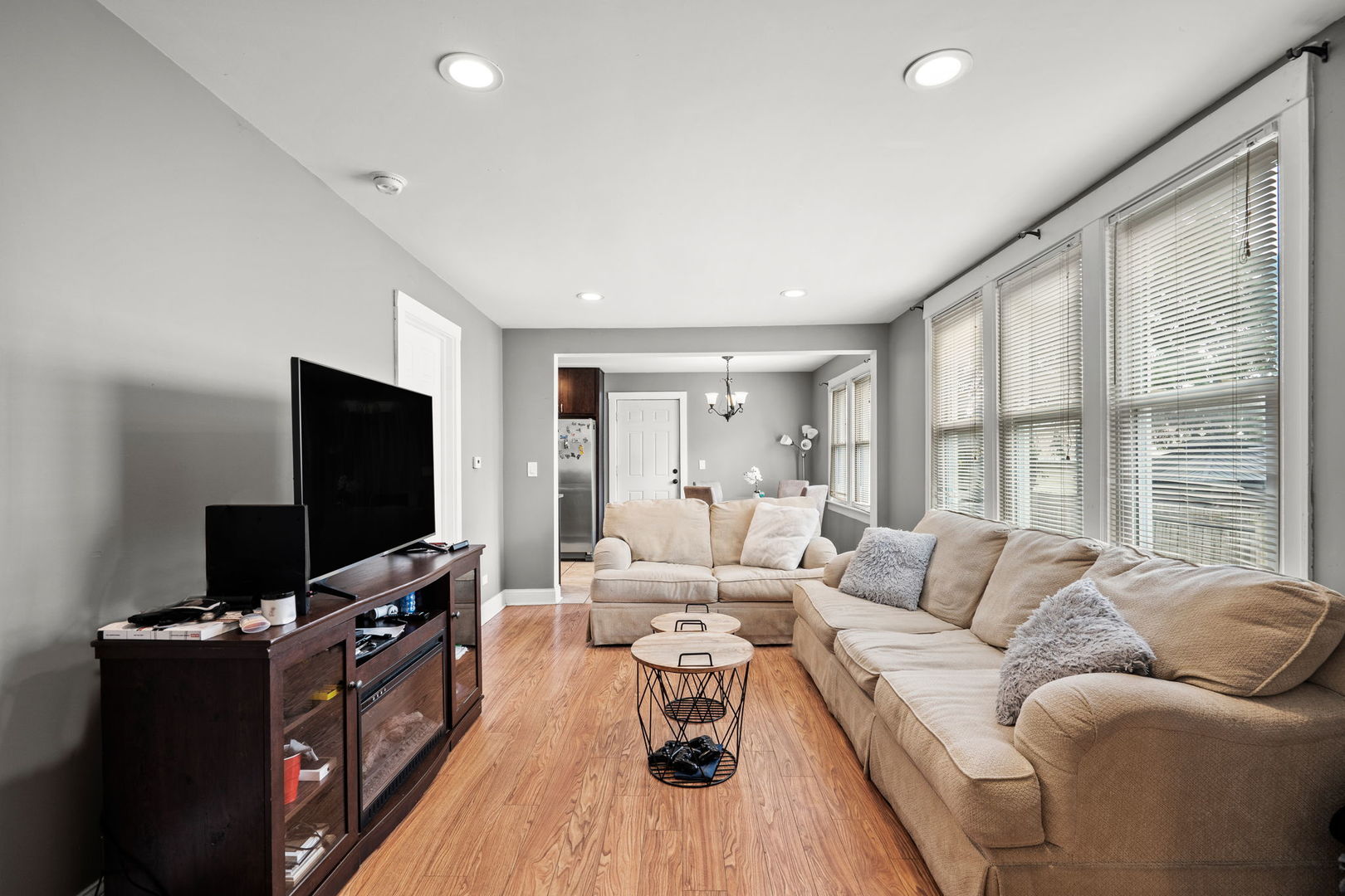 8103 46th Street Lyons, IL 60534 - Photo 5 of 14 a living room with furniture and a flat screen tv