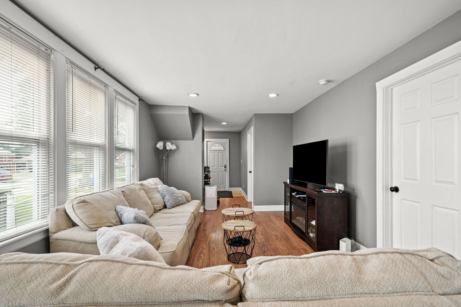 8103 46th Street Lyons, IL 60534 - Photo 6 of 14 a living room with furniture and a flat screen tv