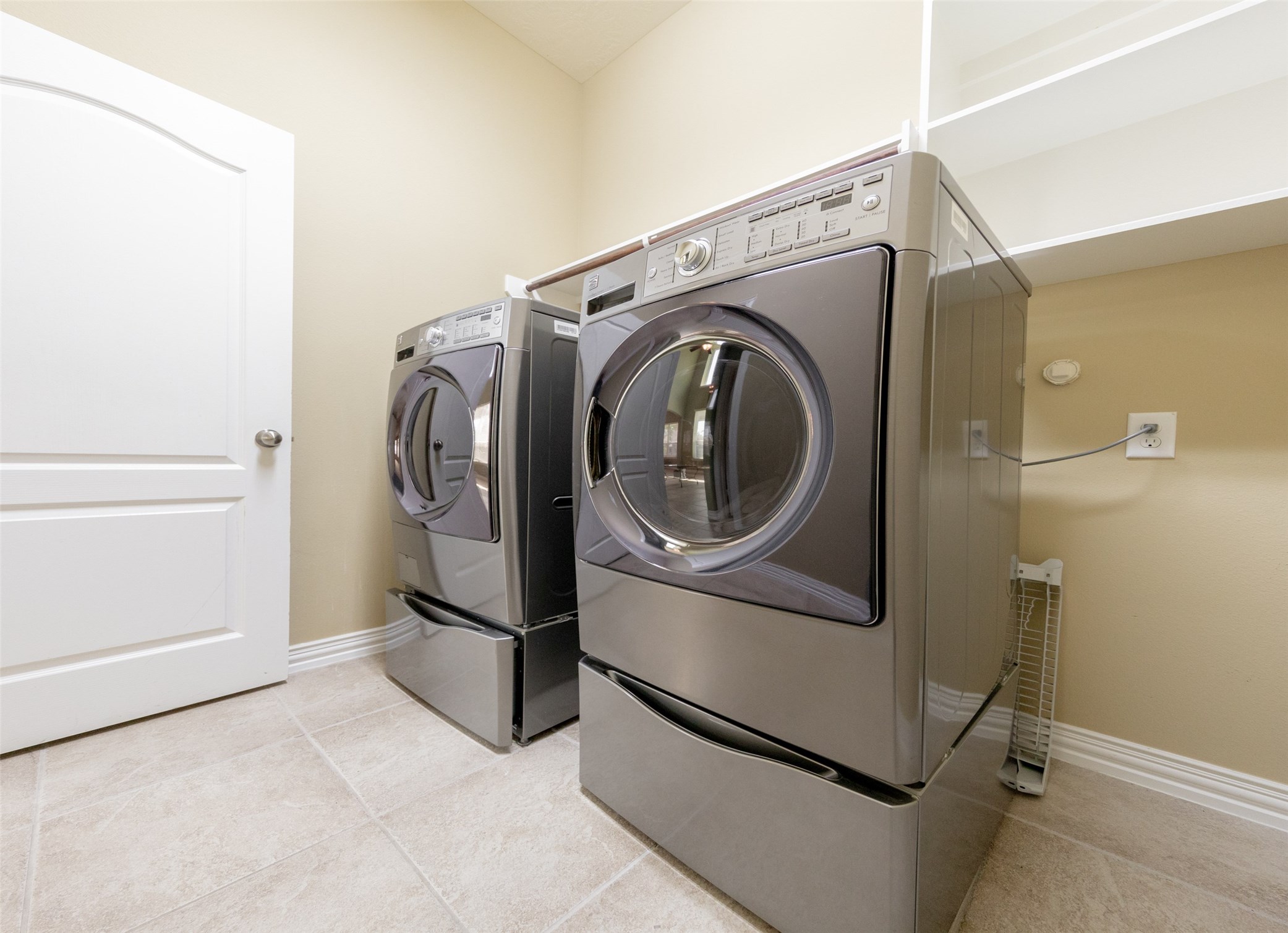 25023 Florina Ranch Drive Katy, TX 77494 - Photo 12 of 12 a utility room with dryer and washer
