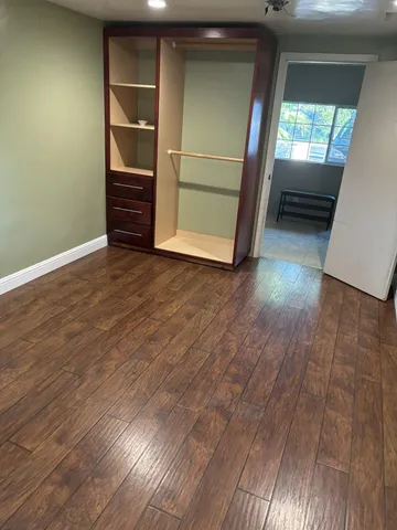 a view of a couches and table in a patio