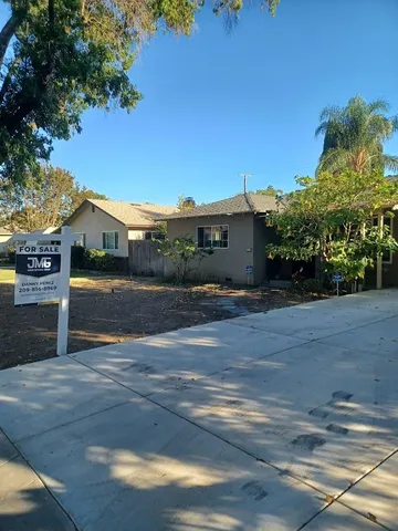 a car parked in front of a house