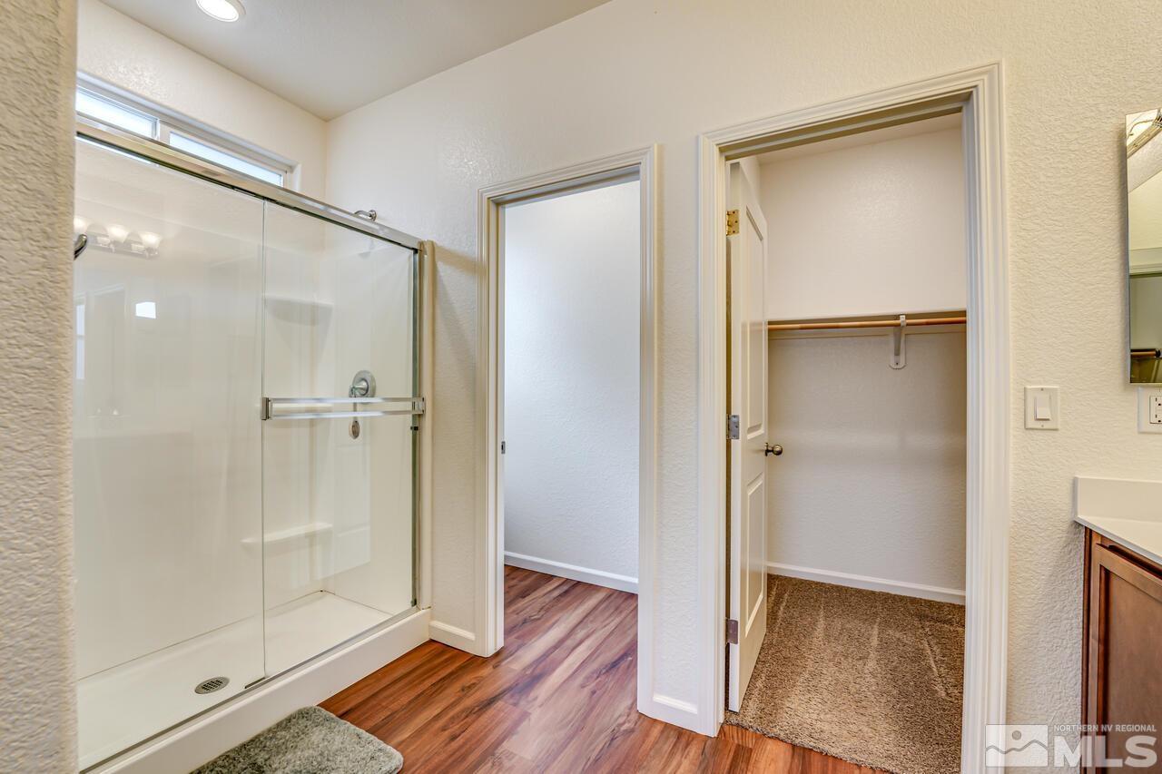 9344 Bay Reno, NV 89506 - Photo 26 of 31 a bathroom with a glass shower door
