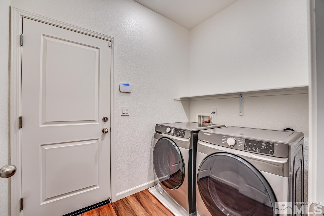 9344 Bay Reno, NV 89506 - Photo 29 of 31 a view of storage and utility room with washer and dryer