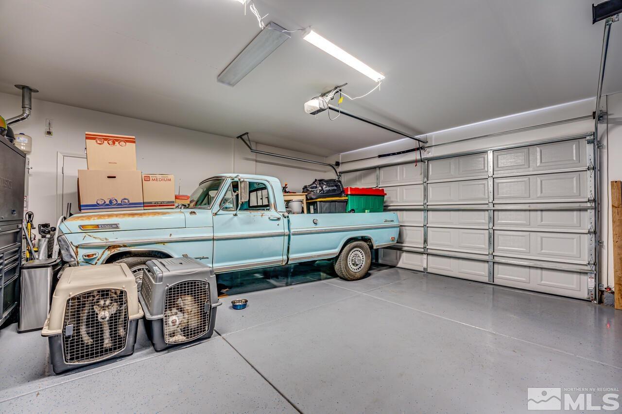 9344 Bay Reno, NV 89506 - Photo 30 of 31 a view of a garage and car parked