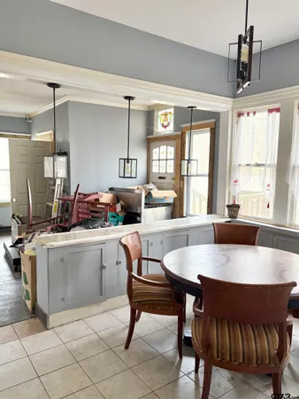 a view of a livingroom with furniture and window