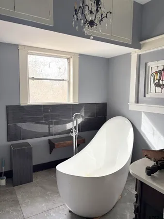 a bathroom with a toilet and a sink