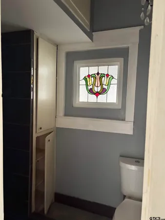 a bathroom with a sink and a shower