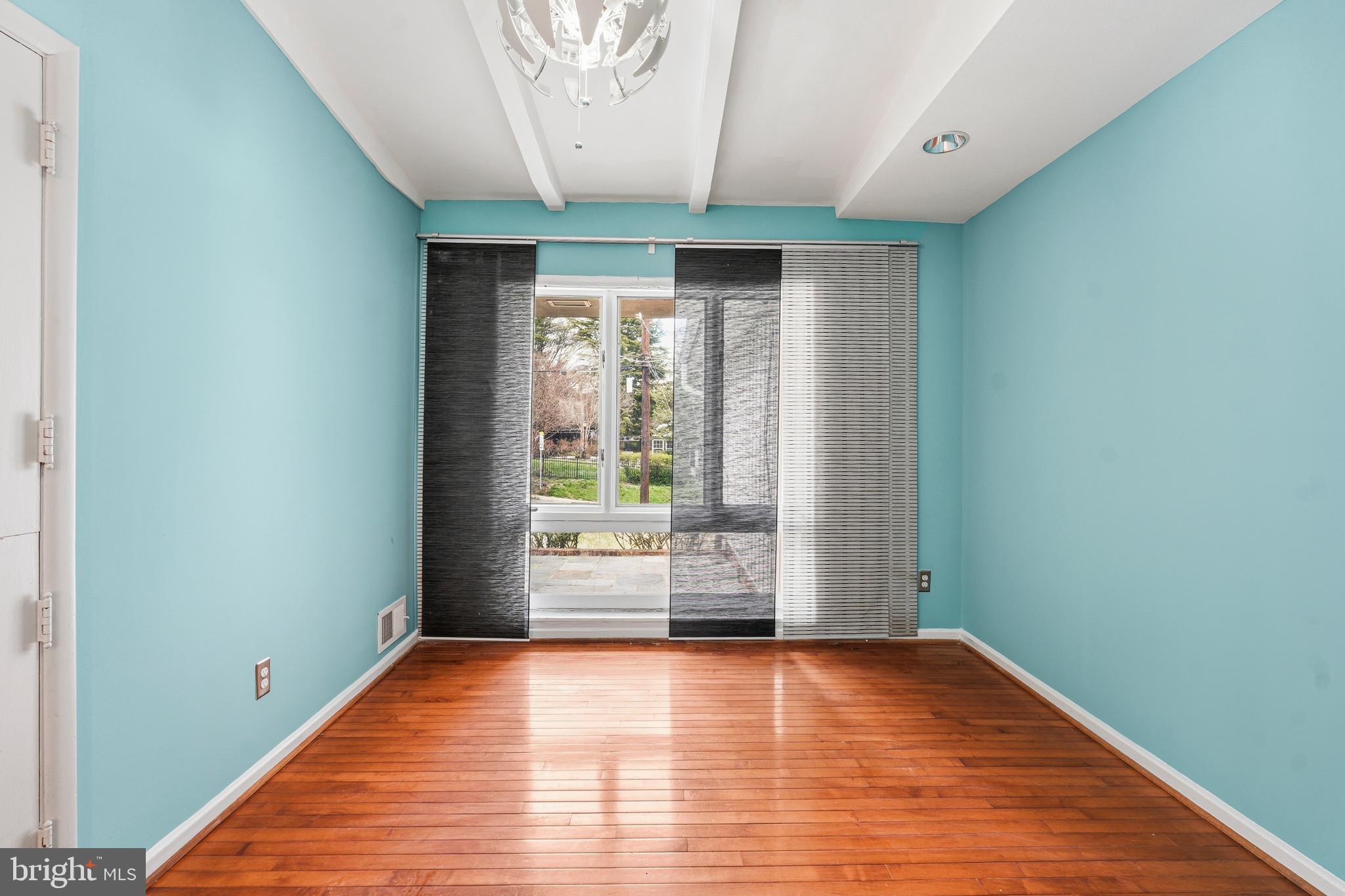 700 Greyrock Drive Silver Spring, MD 20910 - Photo 25 of 48 a view of room with window and wooden floor
