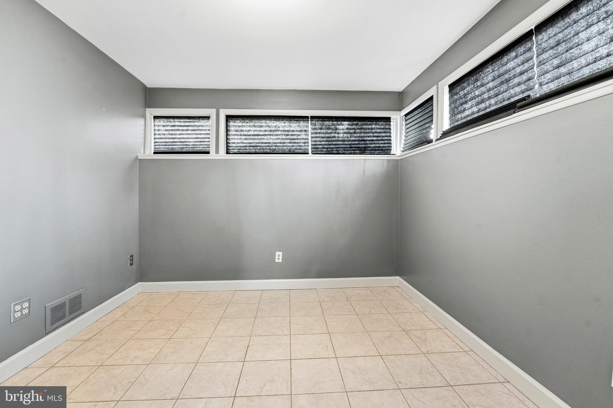 700 Greyrock Drive Silver Spring, MD 20910 - Photo 30 of 48 an empty room with windows