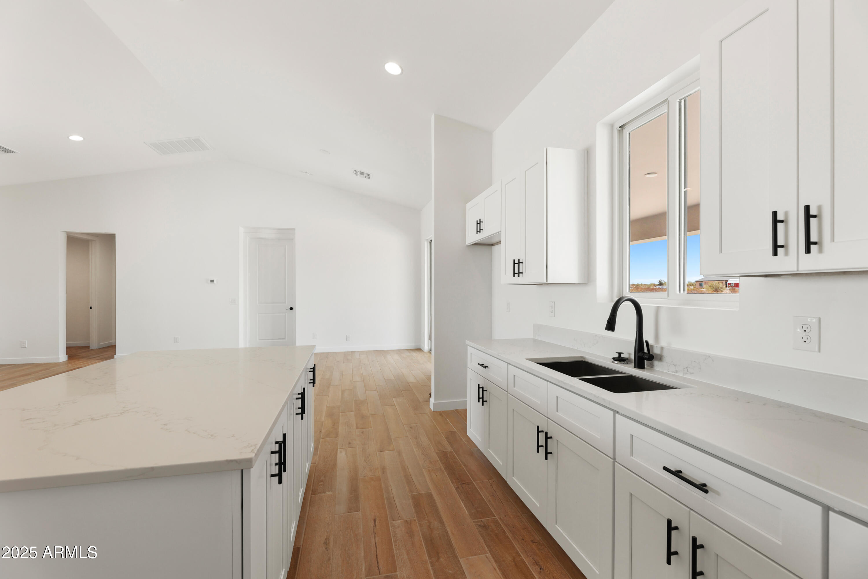 22750 East Roper Lane Florence, AZ 85132 - Photo 12 of 29 a kitchen with stainless steel appliances granite countertop a sink stove and refrigerator