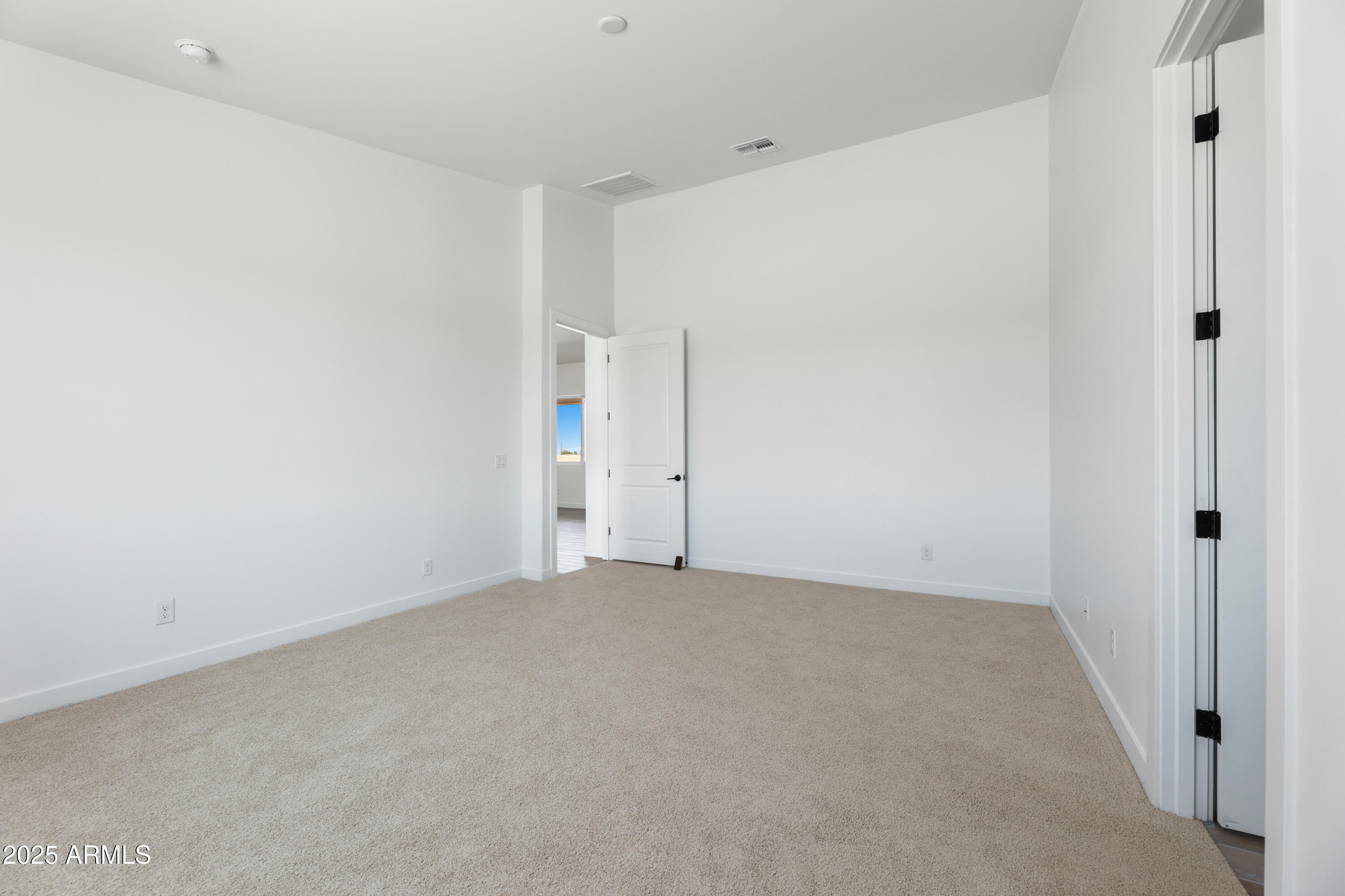 22750 East Roper Lane Florence, AZ 85132 - Photo 14 of 29 a view of an empty room