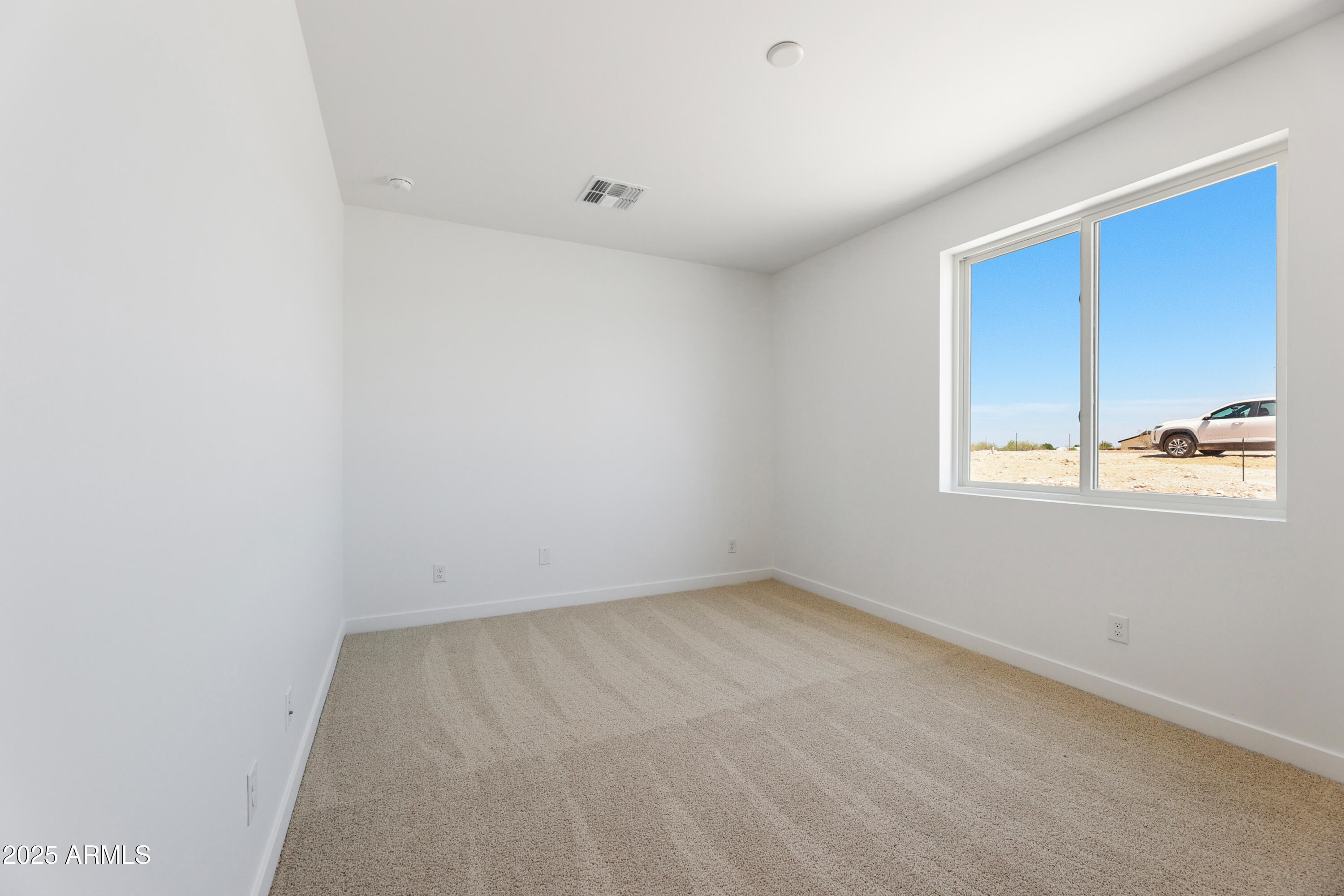 22750 East Roper Lane Florence, AZ 85132 - Photo 18 of 29 a view of an empty room