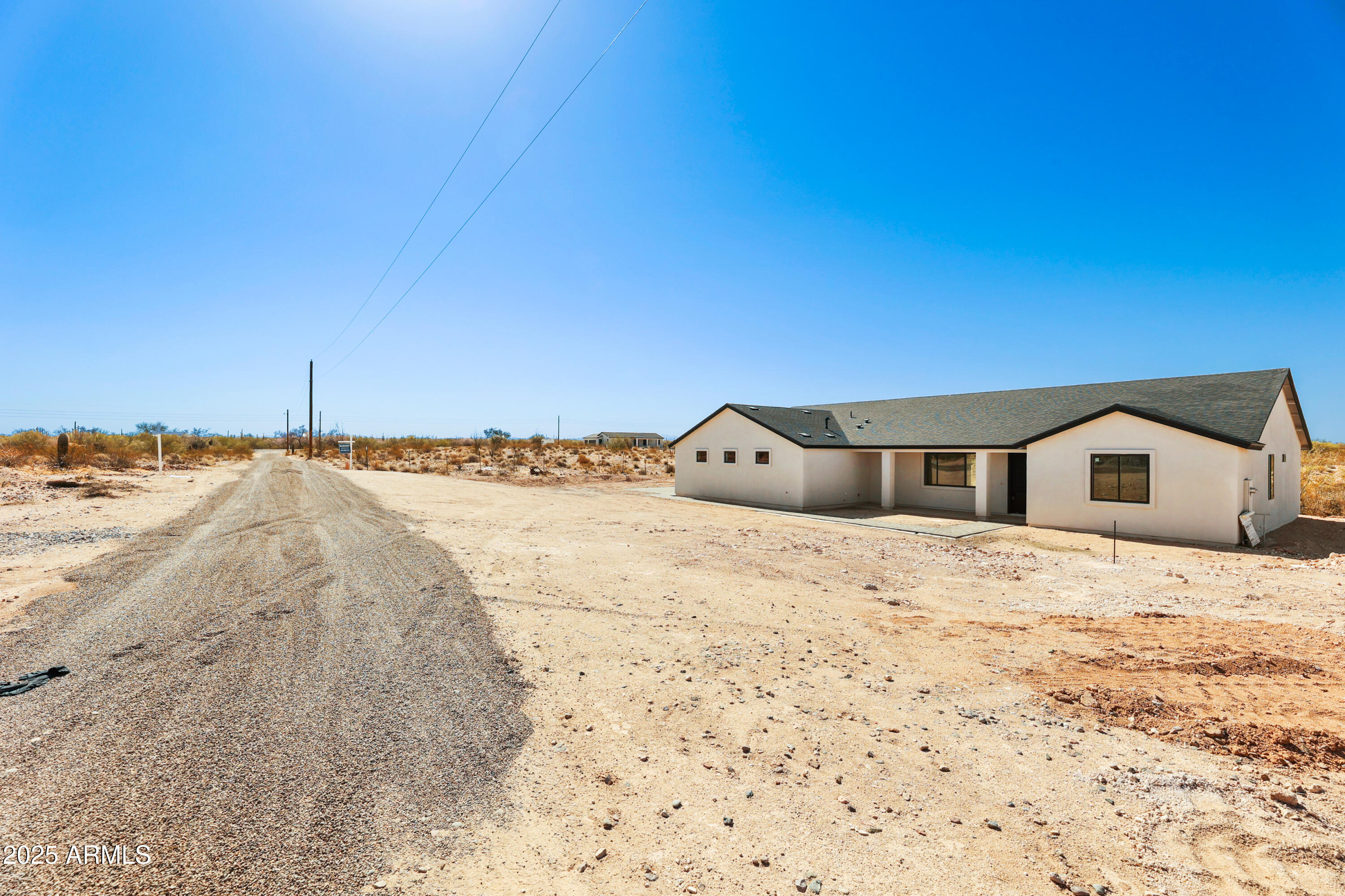 22750 East Roper Lane Florence, AZ 85132 - Photo 4 of 29 a house with a snow in the background