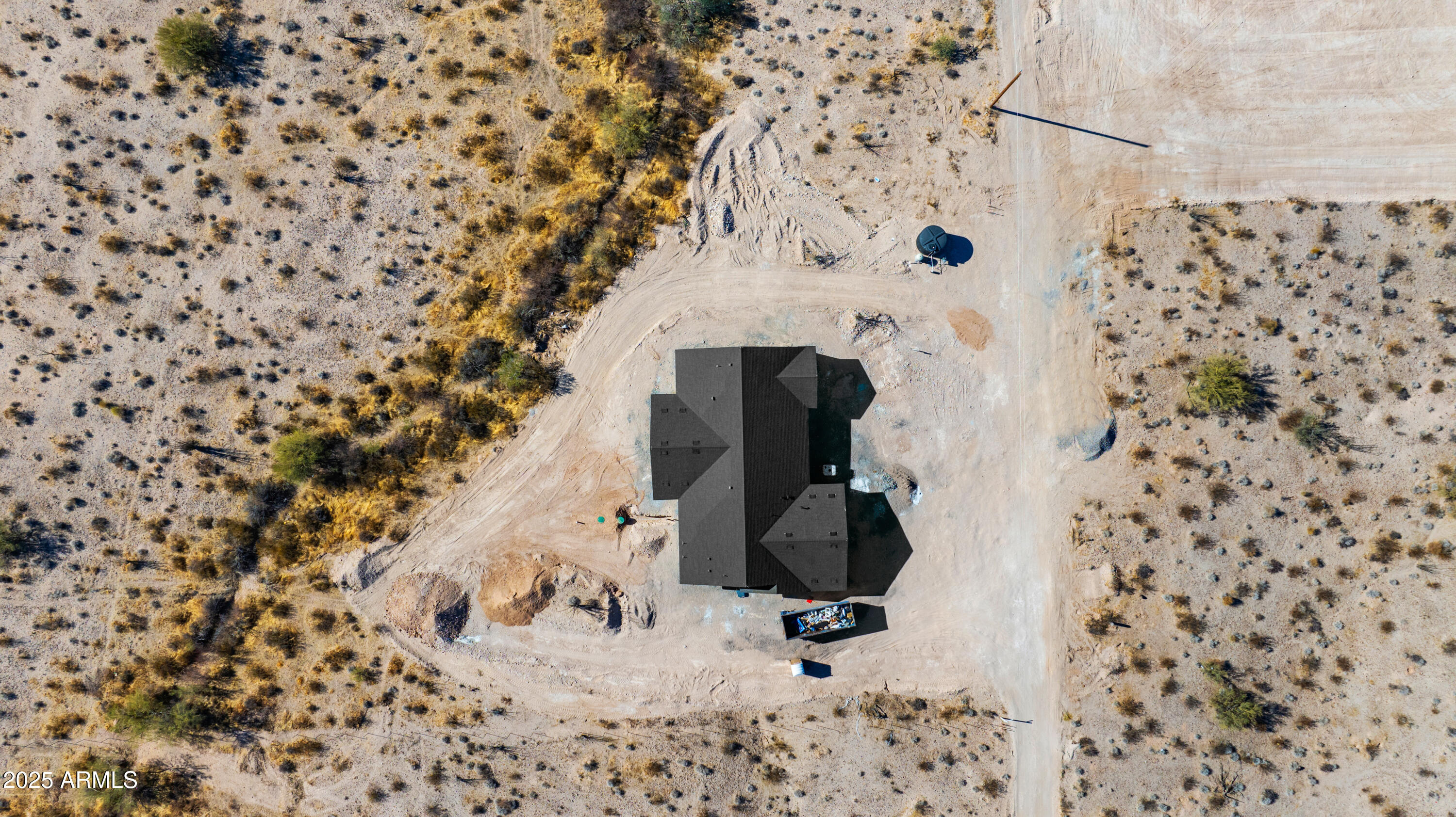 22750 East Roper Lane Florence, AZ 85132 - Photo 5 of 29 a bathroom with a shower curtain and a potted plant