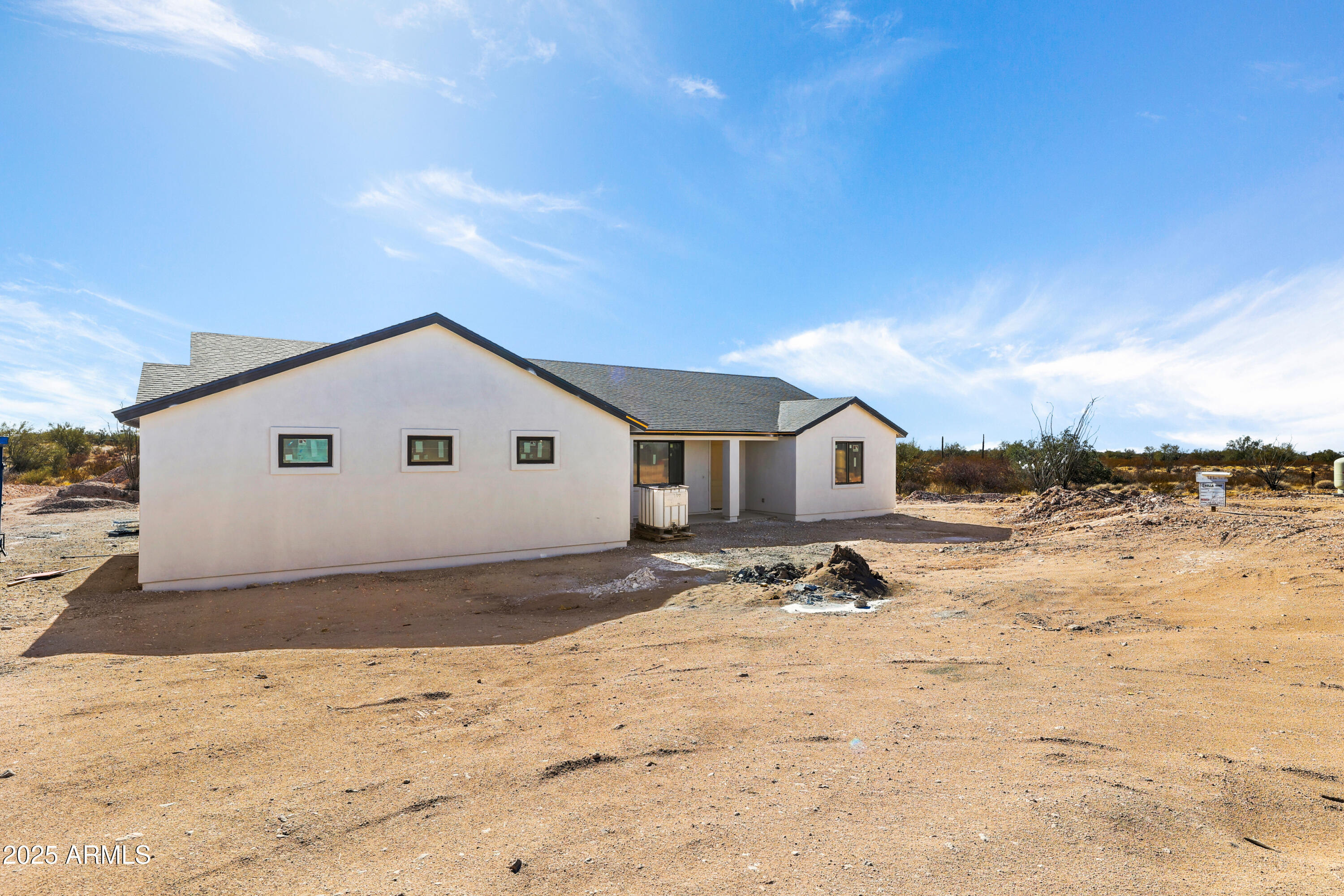 22750 East Roper Lane Florence, AZ 85132 - Photo 7 of 29 a view of a house with snow on the background