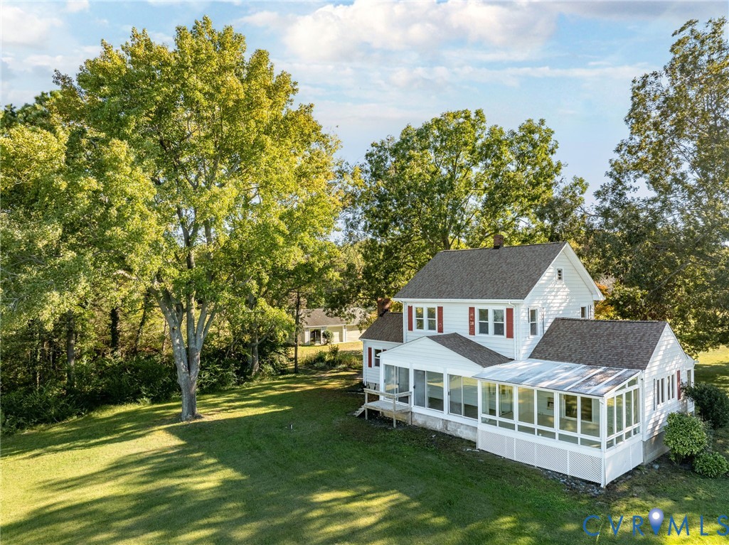 1126 Cloverdale Road Laneview, VA 22504 - Photo 14 of 49 a front view of a house with garden