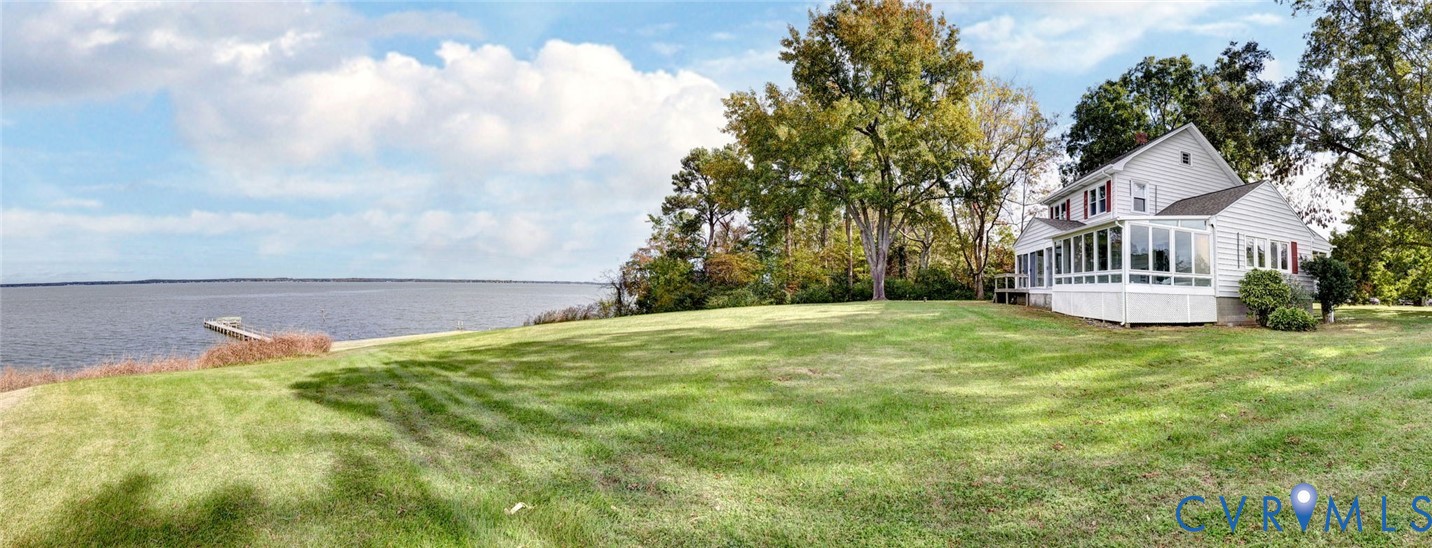 1126 Cloverdale Road Laneview, VA 22504 - Photo 2 of 49 a view of a house with a yard and pathway