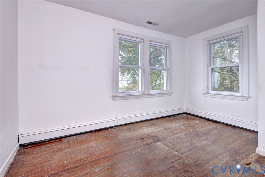 1126 Cloverdale Road Laneview, VA 22504 - Photo 40 of 49 an empty room with windows