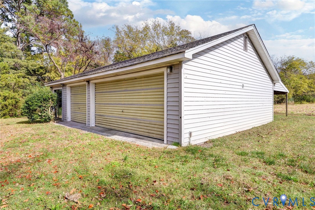 1126 Cloverdale Road Laneview, VA 22504 - Photo 42 of 49 a view of a house with a yard