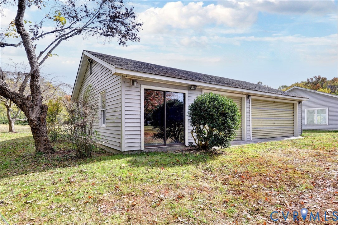 1126 Cloverdale Road Laneview, VA 22504 - Photo 43 of 49 a view of a house with a yard