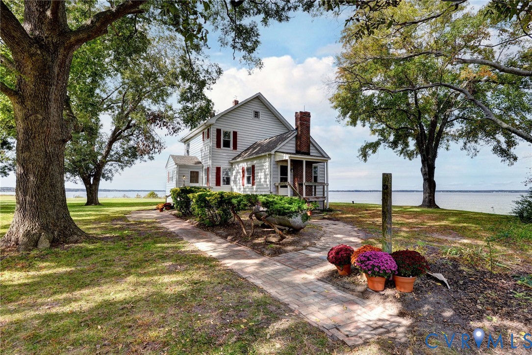 1126 Cloverdale Road Laneview, VA 22504 - Photo 9 of 49 a view of a house with swimming pool and sitting area