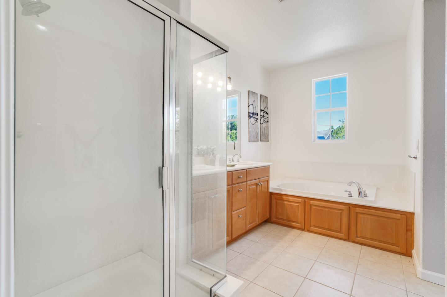 1812 Nancy Lane San Ramon, CA 94582 - Photo 29 of 69 a bathroom with a bathtub sink and mirror