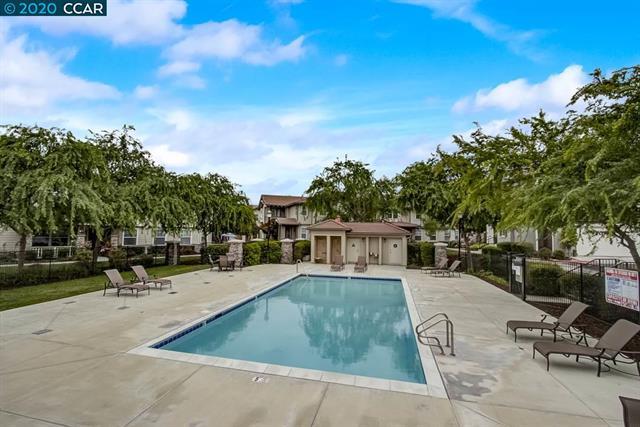 1812 Nancy Lane San Ramon, CA 94582 - Photo 63 of 69 a view of a swimming pool with an outdoor seating and a pathway