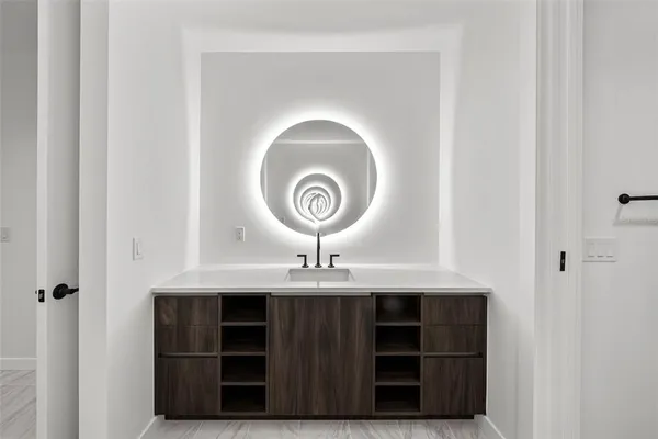 a bedroom with a bed and a walk in closet