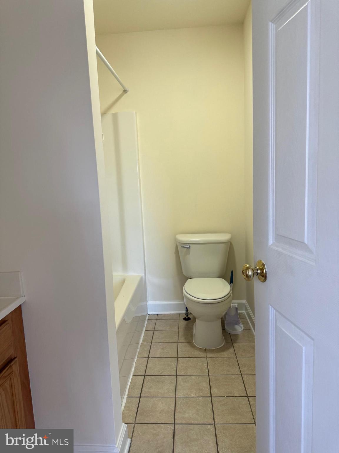 405 1/2 Elm Street Winchester, VA 22601 - Photo 5 of 16 a bathroom with a toilet and a shower