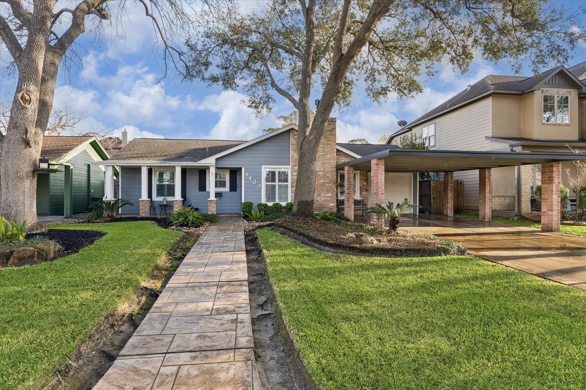 1423 Richelieu Lane Houston, TX 77018 - Photo 1 of 46 a front view of a house with swimming pool having outdoor seating