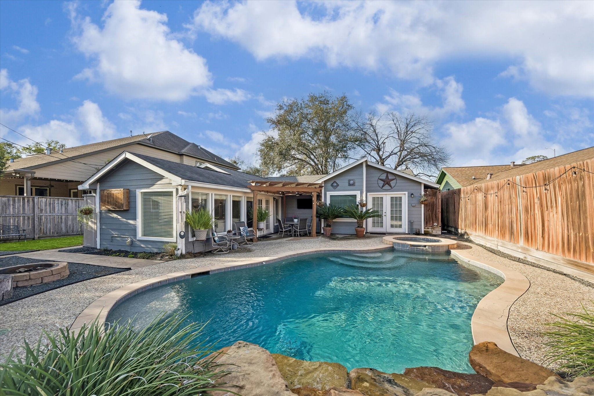 1423 Richelieu Lane Houston, TX 77018 - Photo 27 of 46 a front view of house with yard and seating area