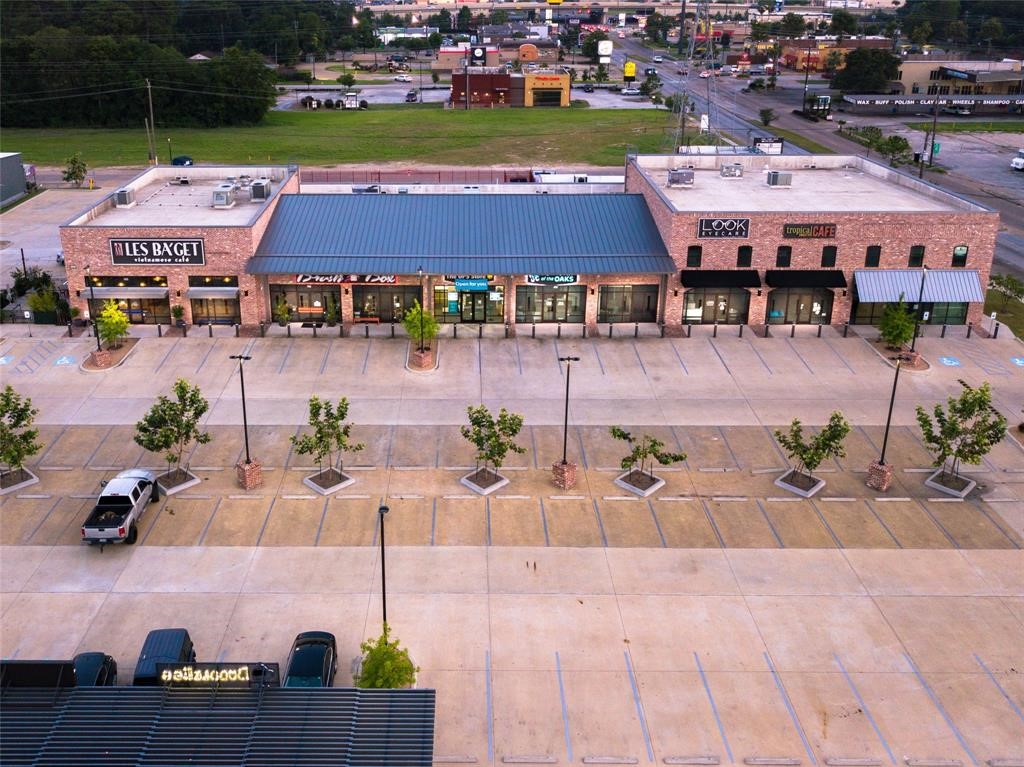 1423 Richelieu Lane Houston, TX 77018 - Photo 42 of 46 an aerial view of a house with yard and seating space