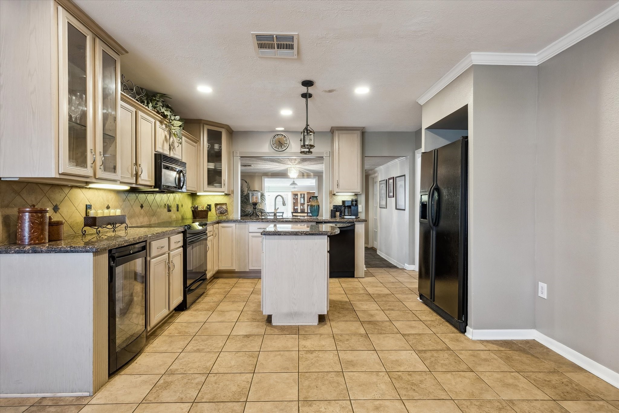 1423 Richelieu Lane Houston, TX 77018 - Photo 8 of 46 a kitchen with stainless steel appliances granite countertop a refrigerator and a stove