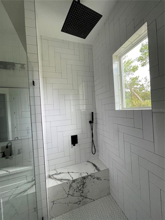 41719 Aspen Street Eustis, FL 32736 - Photo 41 of 52 a bathroom with a shower