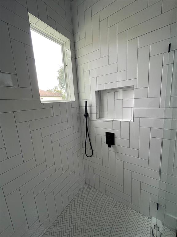 41719 Aspen Street Eustis, FL 32736 - Photo 42 of 52 a bathroom with a shower