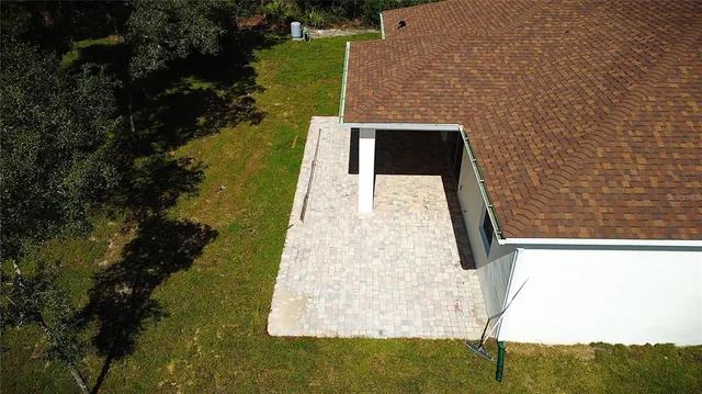 a view of an outdoor space and swimming pool