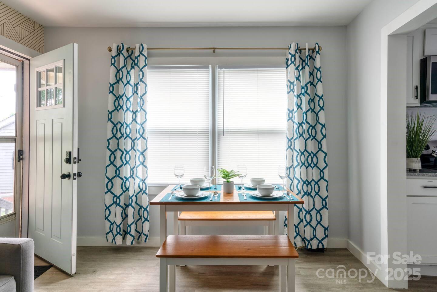 3337 Washburn Avenue Charlotte, NC 28205 - Photo 11 of 23 a potted plant sitting in front of a window