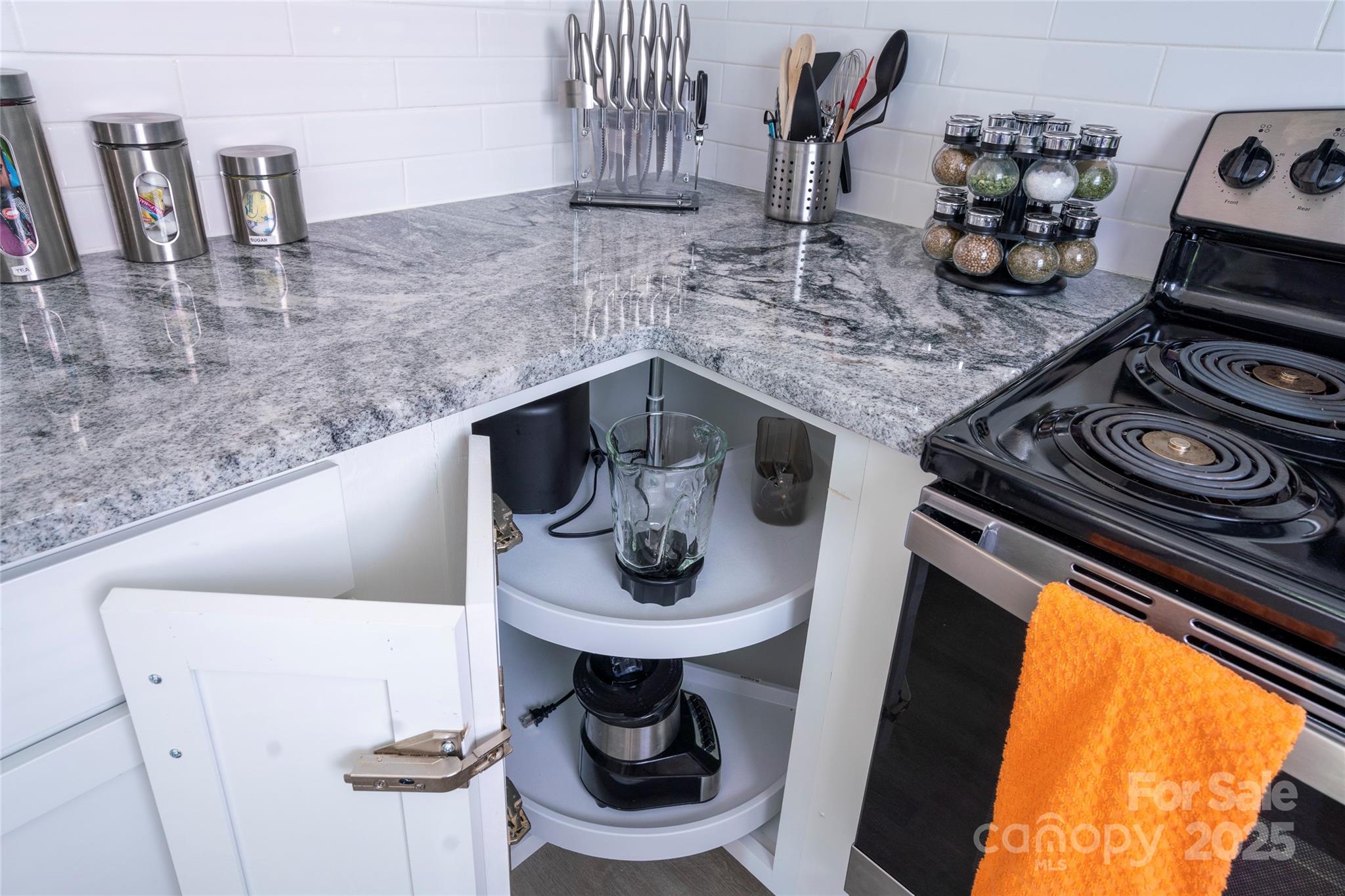 3337 Washburn Avenue Charlotte, NC 28205 - Photo 5 of 23 a kitchen with a stove and cabinets
