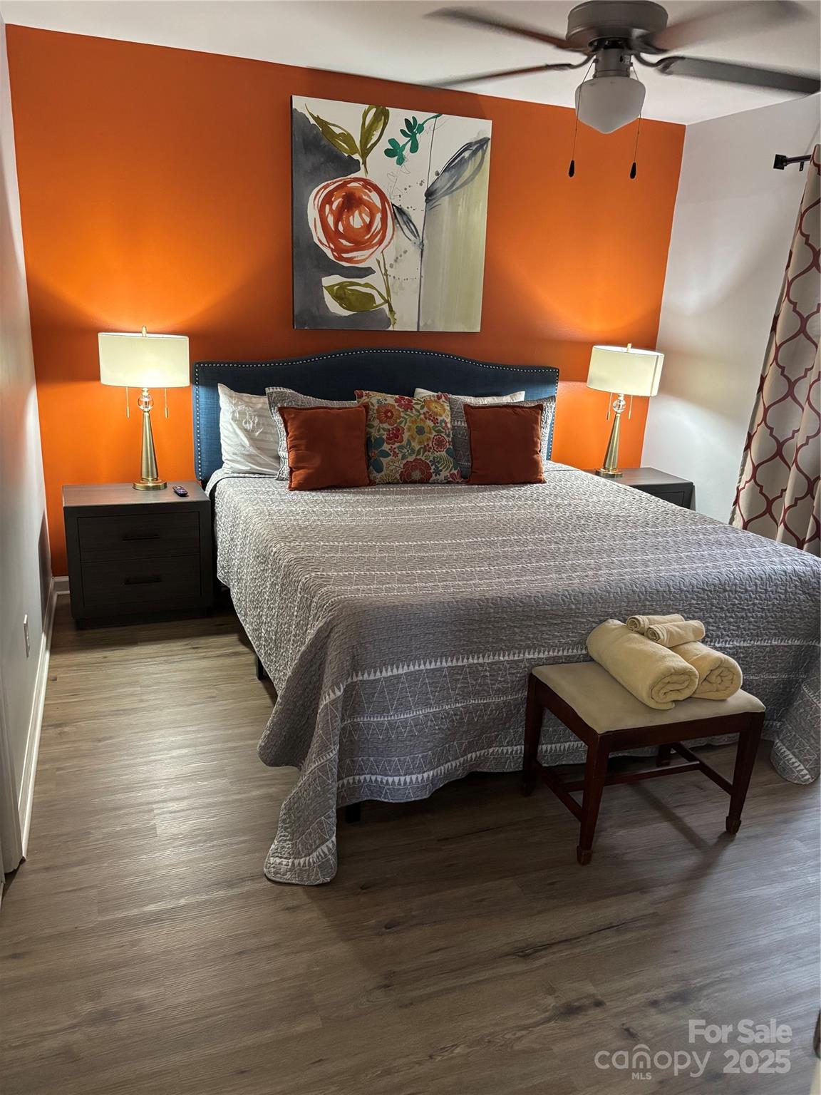 3337 Washburn Avenue Charlotte, NC 28205 - Photo 9 of 23 a bedroom with a bed and wooden floor