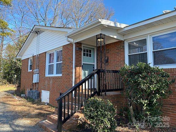 3337 Washburn Avenue Charlotte, NC 28205 - Photo 10 of 23 a front view of house with stairs and garden