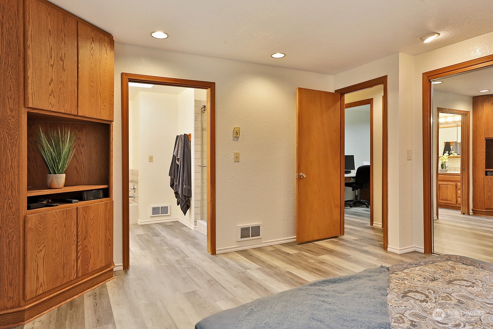 5003 East Harbor Road Freeland, WA 98249 - Photo 18 of 40 a view of a hallway with wooden floor and cabinet