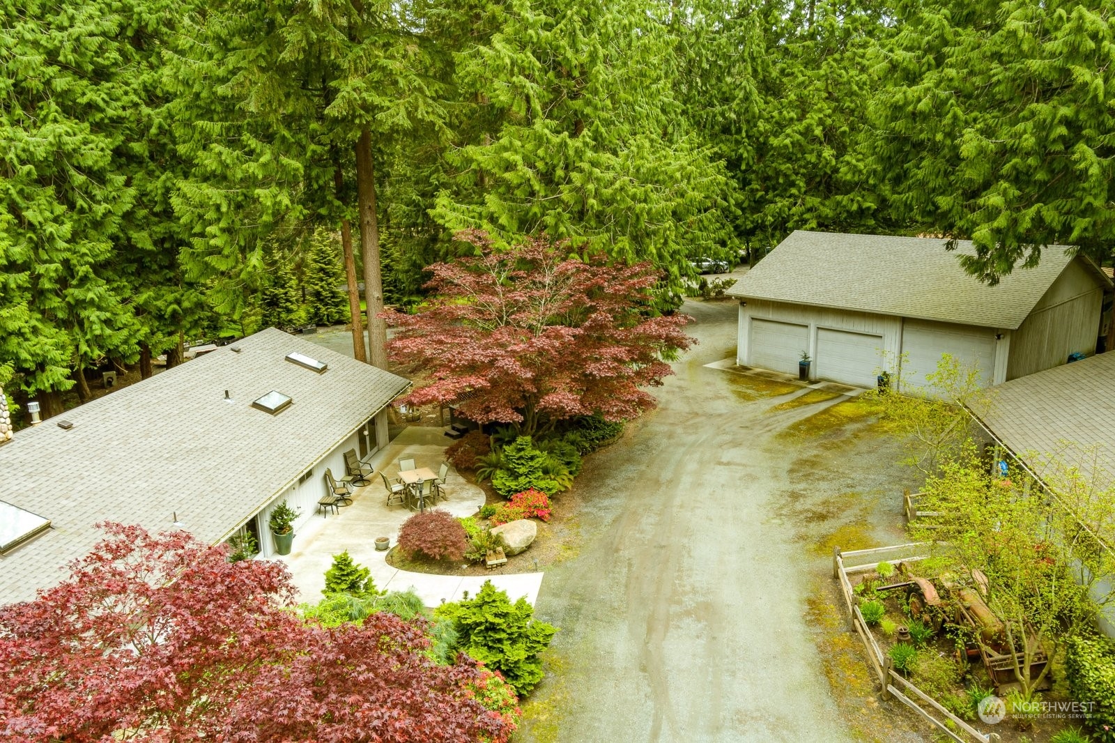 5003 East Harbor Road Freeland, WA 98249 - Photo 29 of 40 an aerial view of a house with a yard